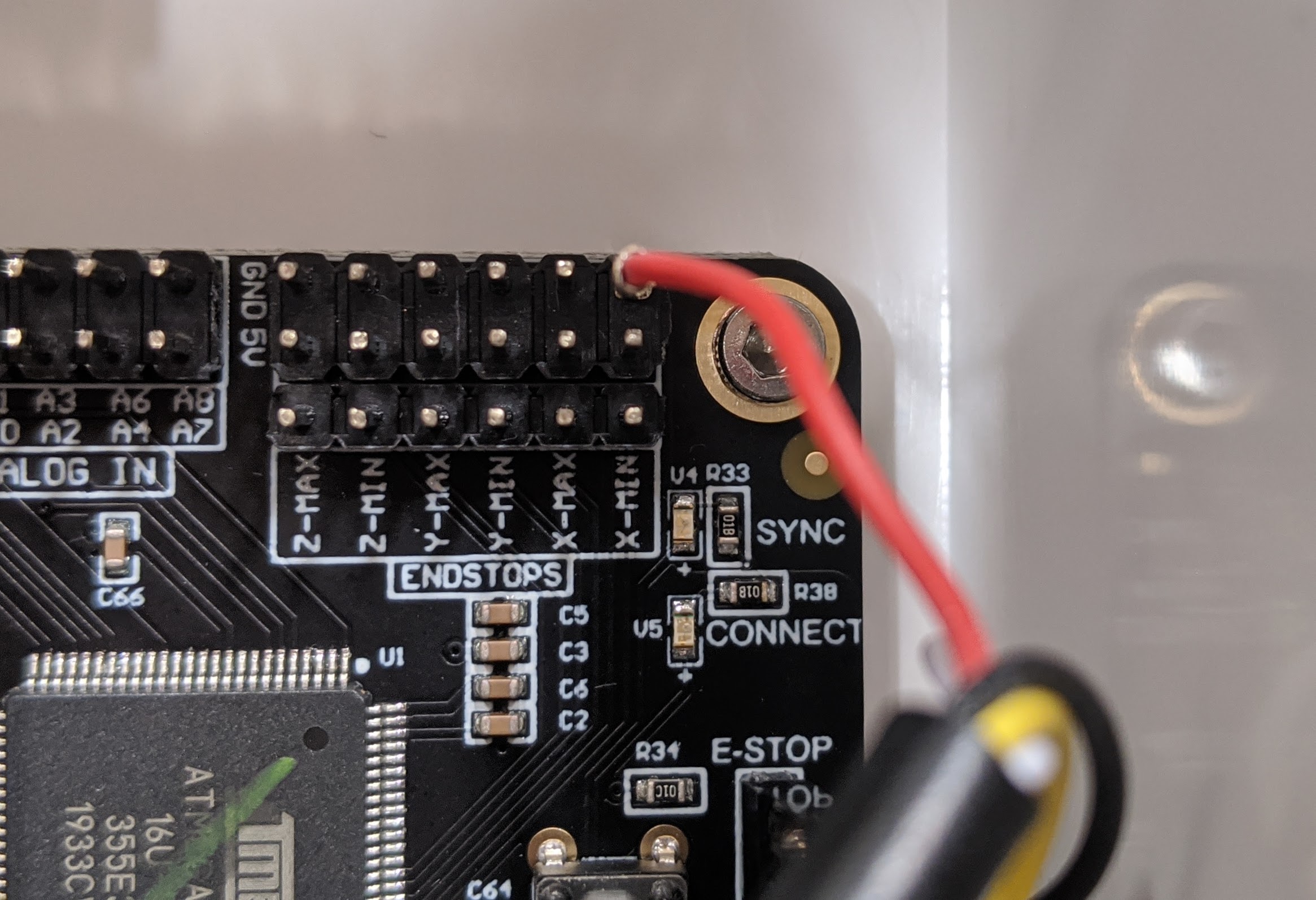 fixed e-stop button wiring close-up