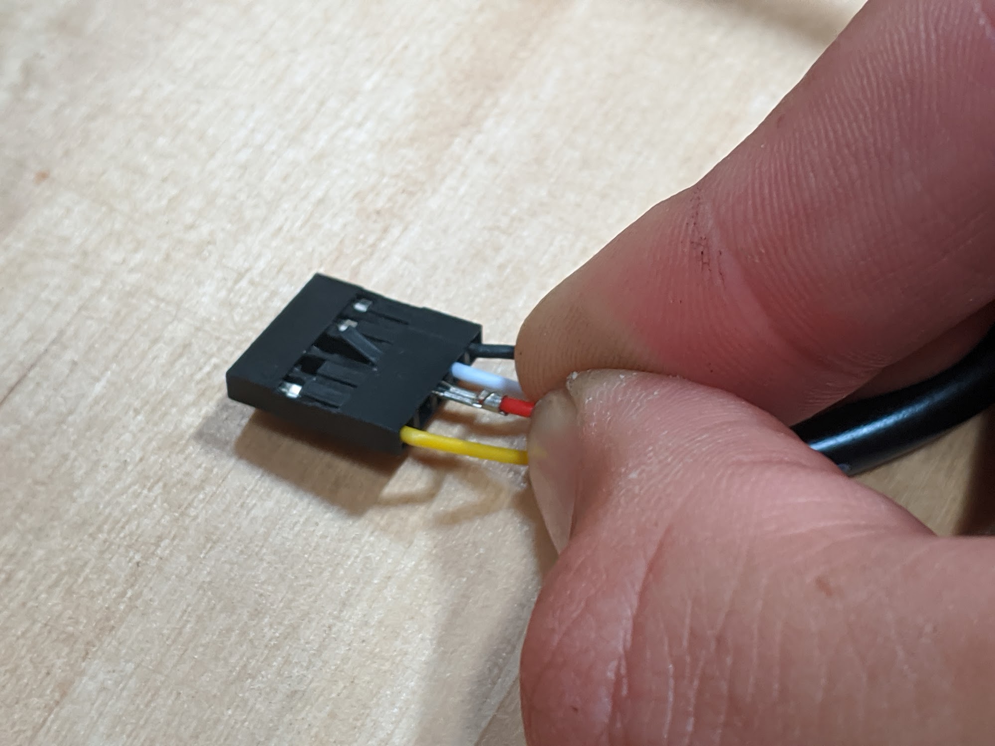 remove red wire from connector